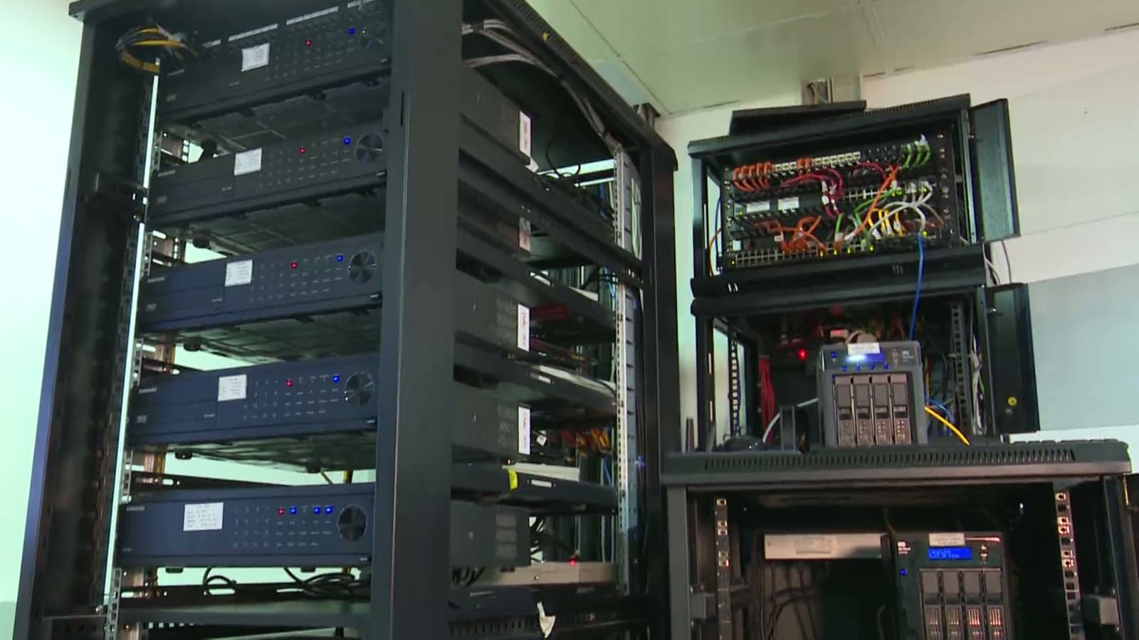 Racks of network and radio equipment in an equipment room